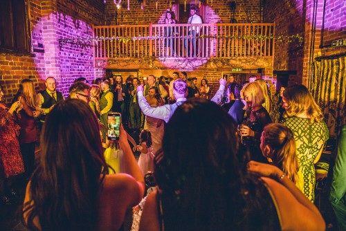 Guests dancing to the Wedding Disco at Curradine Barns in Shrawley