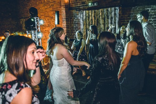 The Bride and guests dancing to the Wedding Disco at Curradine Barns in Shrawley, WorcestershireGuests dancing to the Wedding DJ at Curradine Barns in Shrawley, Worcestershire