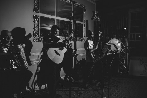 A Ceilidh Band performing alongside the Wedding Disco at Brockencote Hall in Kidderminster, Worcestershire