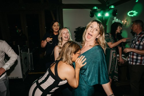 Guests having fun at a wedding at Mythe Barn