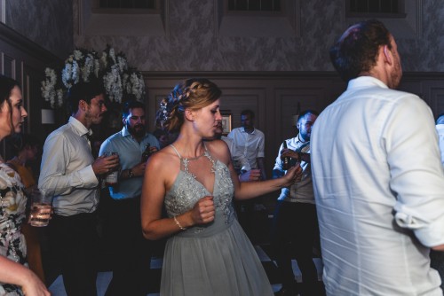 A lady dancing to the Wedding Disco at Stanbrook Abbey Hotel in Worcester, Worcestershire