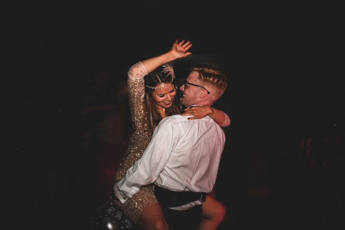 Cameron and Amy dancing to the DJ at Ellenborough Park in Cheltenham, Gloucestershire