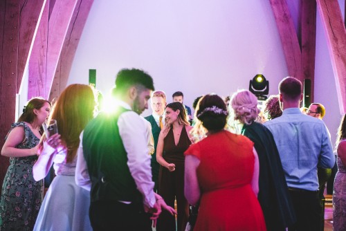 Guests dancing to the Wedding DJ at The Mill Barns in Alveley, Shropshire