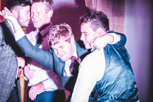 Two men dancing to the Wedding Disco at The Mill Barns in Alveley