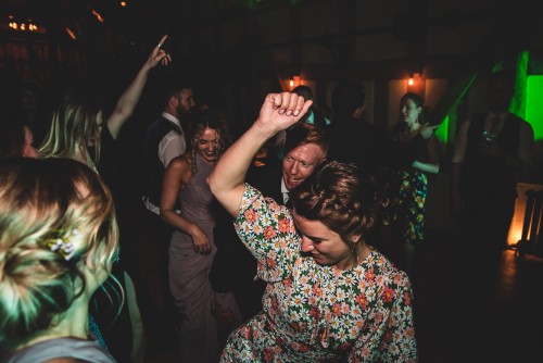 Guests dancing to the Wedding DJ at Barns and Yard at Hanley Hall in Gibert's End, Worcestershire