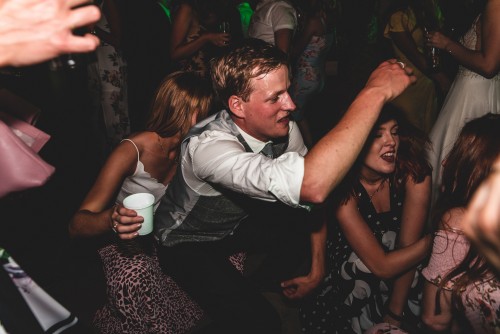 Even more guests dancing to the Mobile Disco at The Riding School, Calke Abbey in Ticknall, Derbyshire