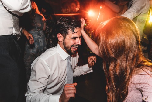 Guest dancing to the Mobile DJ at The Riding School, Calke Abbey in Ticknall, Derbyshire