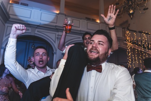 Man lifted up during the Mobile Disco at Middleton Hall in Tamworth, Staffordshire