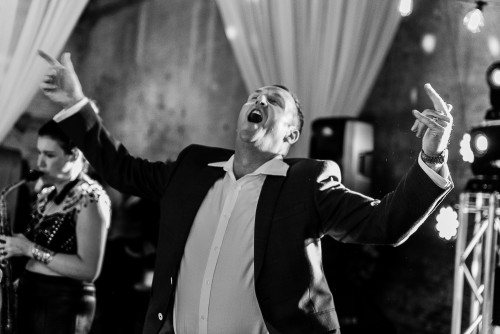 Guest dancing to the Wedding DJ at The Riding School at Calke Abbey