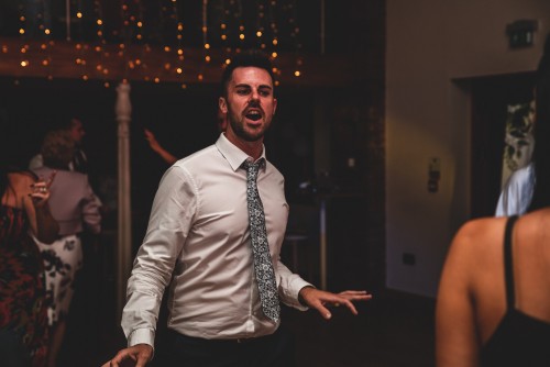 Guest dancing to the Mobile Disco at Wootton Park in Henley-in-Arden, Warwickshire