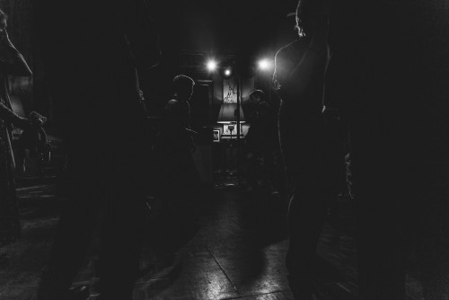 A silhouette of guests dancing to the Wedding DJ at Eastnor Castle in Ledbury, Herefordshire