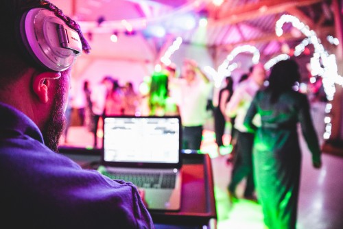 Full dancefloor of guests dancing to Benny Smyth - a Wedding DJ at Redhouse Barn in Bromsgrove, Worcestershire
