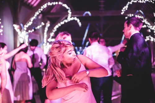 Lady dancing to the Wedding Disco at Redhouse Barn in Bromsgrove, Worcestershire