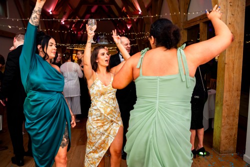 Wedding guests having a great time at The Mill Barns