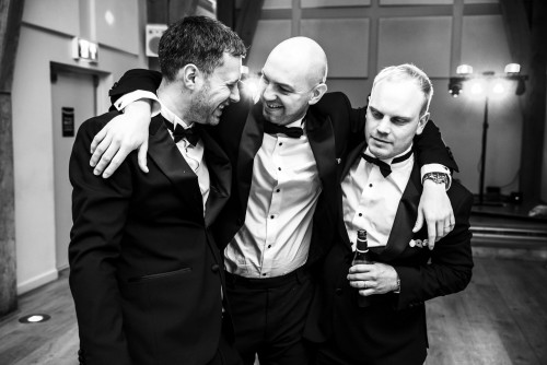 Groomsmen dancing at The Mill Barns